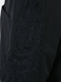 drop-crotch trousers