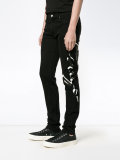 signature print jeans