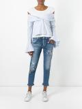 distressed skinny jeans 