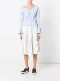 mid-length pleated skirt