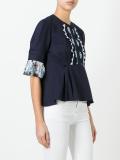 ruffled shortsleeved blouse