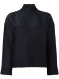 loose-fit turtleneck blouse