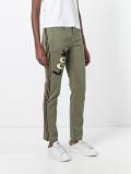 'look' patch slim-fit trousers