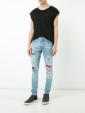 distressed skinny jeans