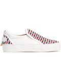 crossed slip-on trainers