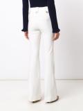 button detailing flared trousers