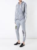 distressed track pants