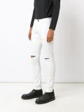 ripped knee skinny jeans
