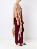 fringed cape