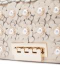 flower embellished clutch
