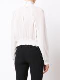 ruffled blouse