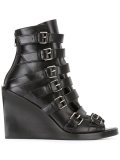 buckled straps boots