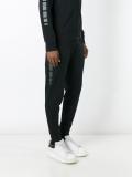 contrast detailing track suit