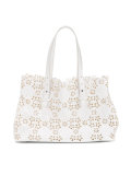 laser cut floral shoulder bag