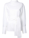 back button fastening shirt