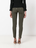 leaf patch skinny trousers