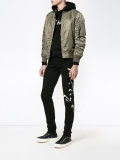 signature print jeans