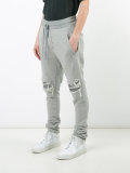 ripped tapered sweatpants
