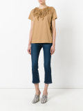 ruffled neck top