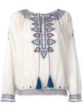 embroidered figures blouse