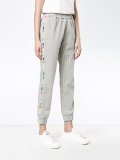 embroidered stripe track pants