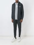 zipped-up hoodie