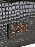 embossed crocodile effect clutch