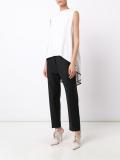 cascading tail sleeveless blouse