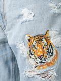 tiger embroidered distressed jeans