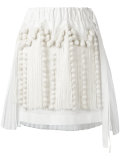 fringed asymmetric skirt