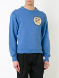 embroidered patch sweater