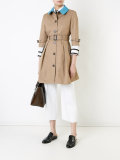 buttoned belted trench