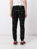 spider embroidered track pants
