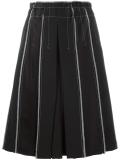 exposed seam pleated skirt