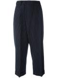 pinstriped tapered trousers