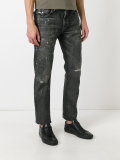 ripped knees tapered jeans