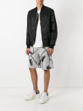 contrast-stitch slogan shorts