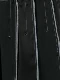 exposed seam pleated skirt