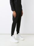 strap detail tapered trousers