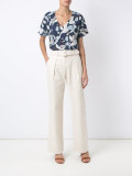 belted flare trousers