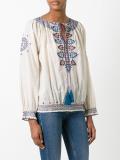 embroidered figures blouse
