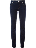 lion head skinny jeans 