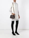 flap closure crossbody bag