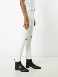 distressed skinny jeans 