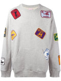 multi patched sweatshirt 