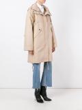 zipped up parka coat