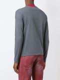 'Kiss the Future' embossed top