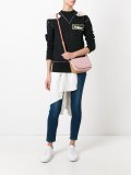 fold-over closure crossbody bag