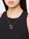 embossed face necklace