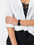 Tomoe bow cuff